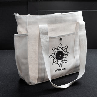 Veske i ubleket bomullskanvas - Flere lommer - Sidserk - Natur